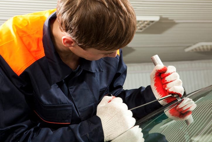 Mechanic working in Auto Repair Shop.